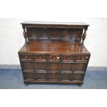 A 20TH CENTURY OAK SIDEBOARD/DRINKS CABINET, with raised back, base with three drawers above two