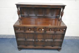 A 20TH CENTURY OAK SIDEBOARD/DRINKS CABINET, with raised back, base with three drawers above two