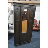 AN OAK MIRRORED SINGLE DOOR WARDROBE, width 91cm x depth 43cm x height 188cm (key)