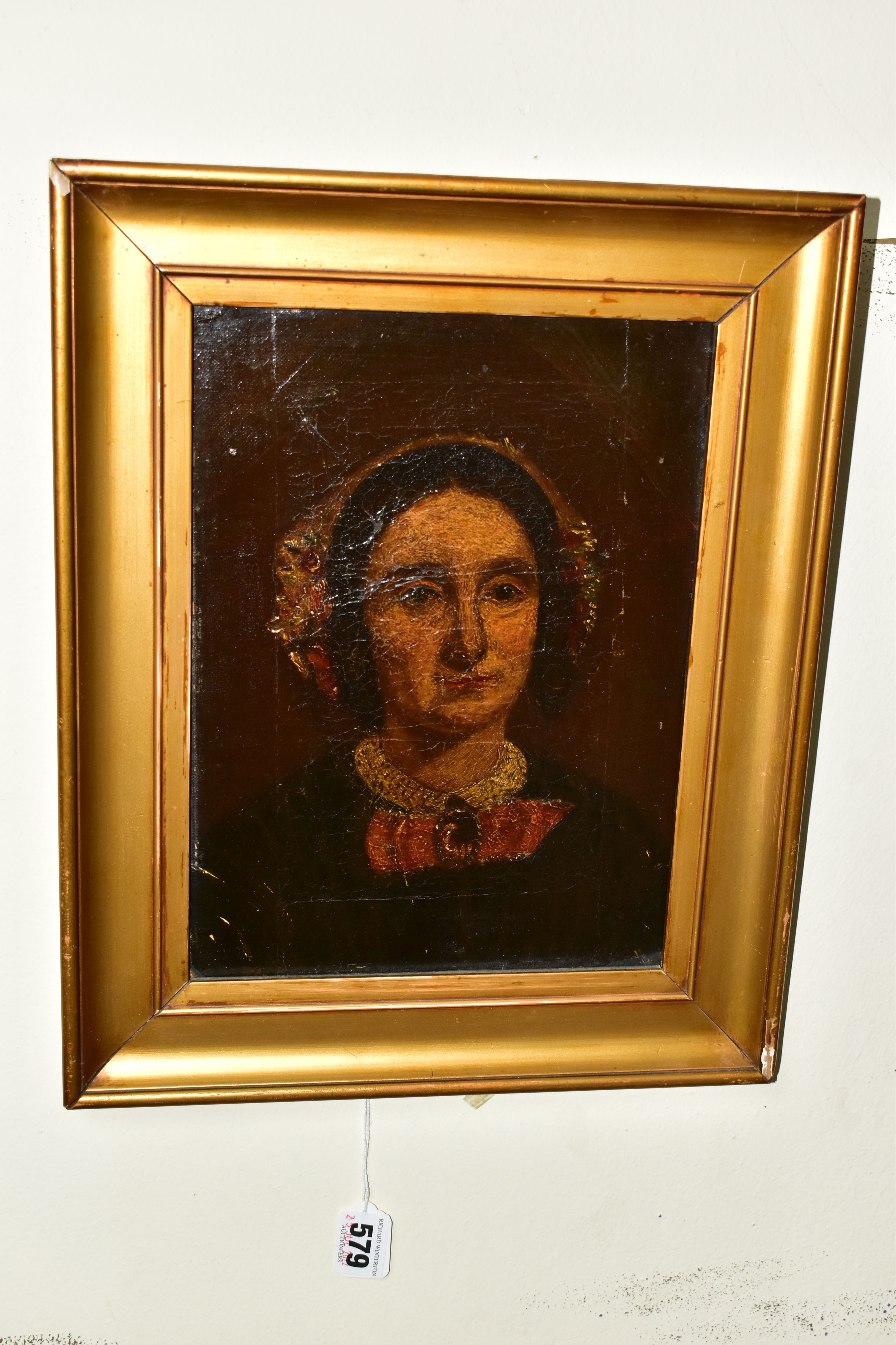 A MID VICTORIAN HEAD AND SHOULDERS PORTRAIT OF A WOMAN, no visible signature, oil on canvas,