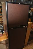A EUROCAVE model No467501 wine cooler/storage, brown in colour with black border, eight shelves