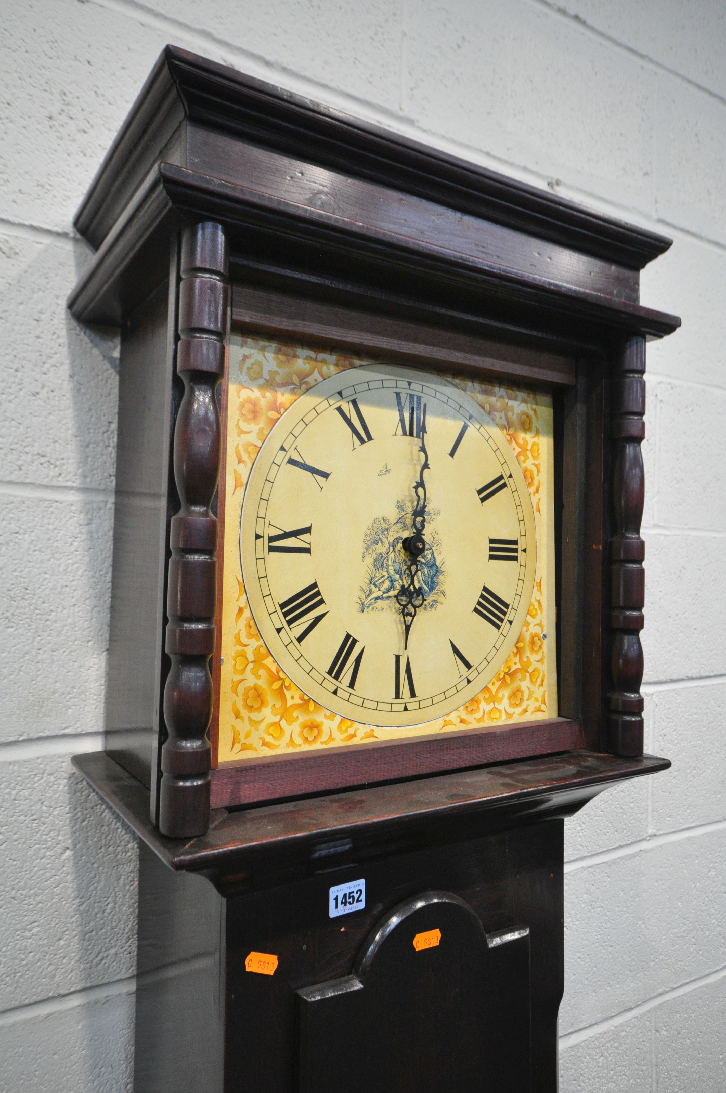 A 20TH CENTURY STAINED WOOD LONGCASE CLOCK, the hood enclosing a painted enamel dial with roman - Image 2 of 2