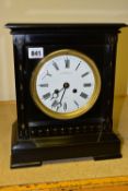 A BLACK SLATE MANTLE CLOCK, SIGNED NATHAN & CO TO THE DIAL, the dial having Roman numeral hour