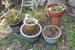 THREE GLAZED PLANT POTS (largest being 37cm in diameter), a painted Terracotta pot and a