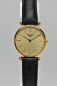 A LADIES 'LONGINES' WRISTWATCH, quartz movement, round champagne dial, signed 'Longines Swiss made',