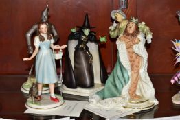 FIVE LENOX 'THE WIZARD OF OZ COLLECTION' FIGURINES, comprising Dorothy, Tin Man, Scarecrow, Cowardly