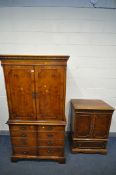 A YEWWOOD TWO DOOR TV CABINET, enclosing a slide and drawers, over double cupboard doors, width