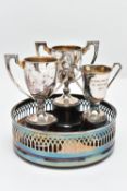 AN ASSORTMENT OF SILVERWARE, to include three small silver trophies, each fitted with black plinths,