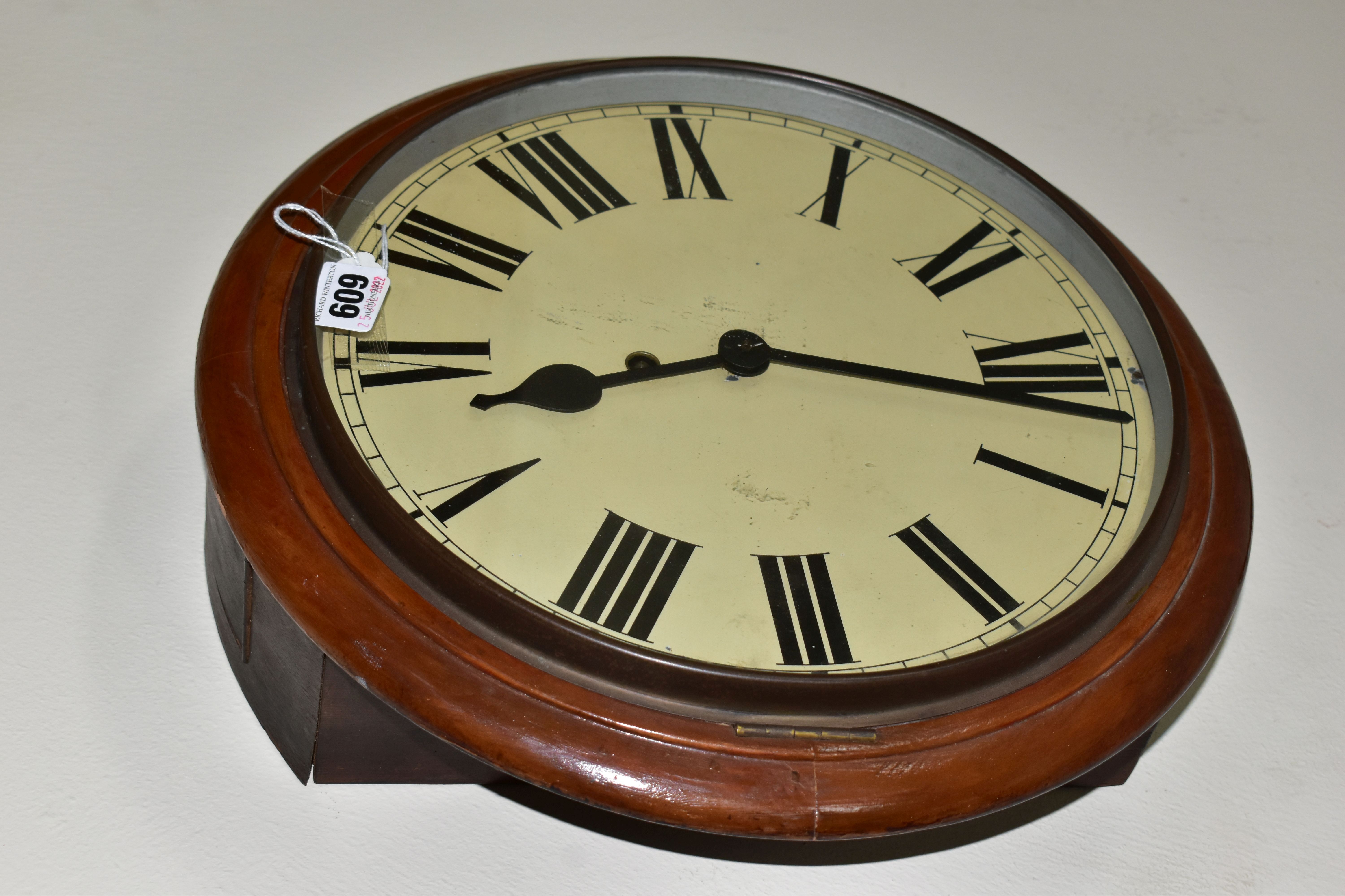 AN EARLY 20TH CENTURY CIRCULAR WALL CLOCK, 'train station style' with pendulum and key, Roman - Image 3 of 4