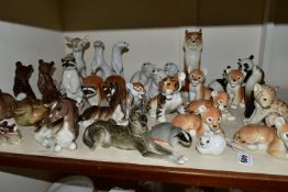A QUANTITY OF LOMONOSOV ANIMAL FIGURES, thirty two figures to include lions, pandas, racoons,