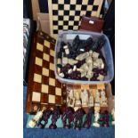 TWO BOXES OF CHESS BOARDS, SET AND PIECES, comprising a folding chess board fitted with wooden