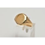 A 9CT GOLD SIGNET RING, oval signet with worn engraving, textured shoulders leading onto a