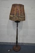 AN EARLY 20TH CENTURY MAHOGANY STANDARD LAMP, with a single shelf, hand painted shade, height with
