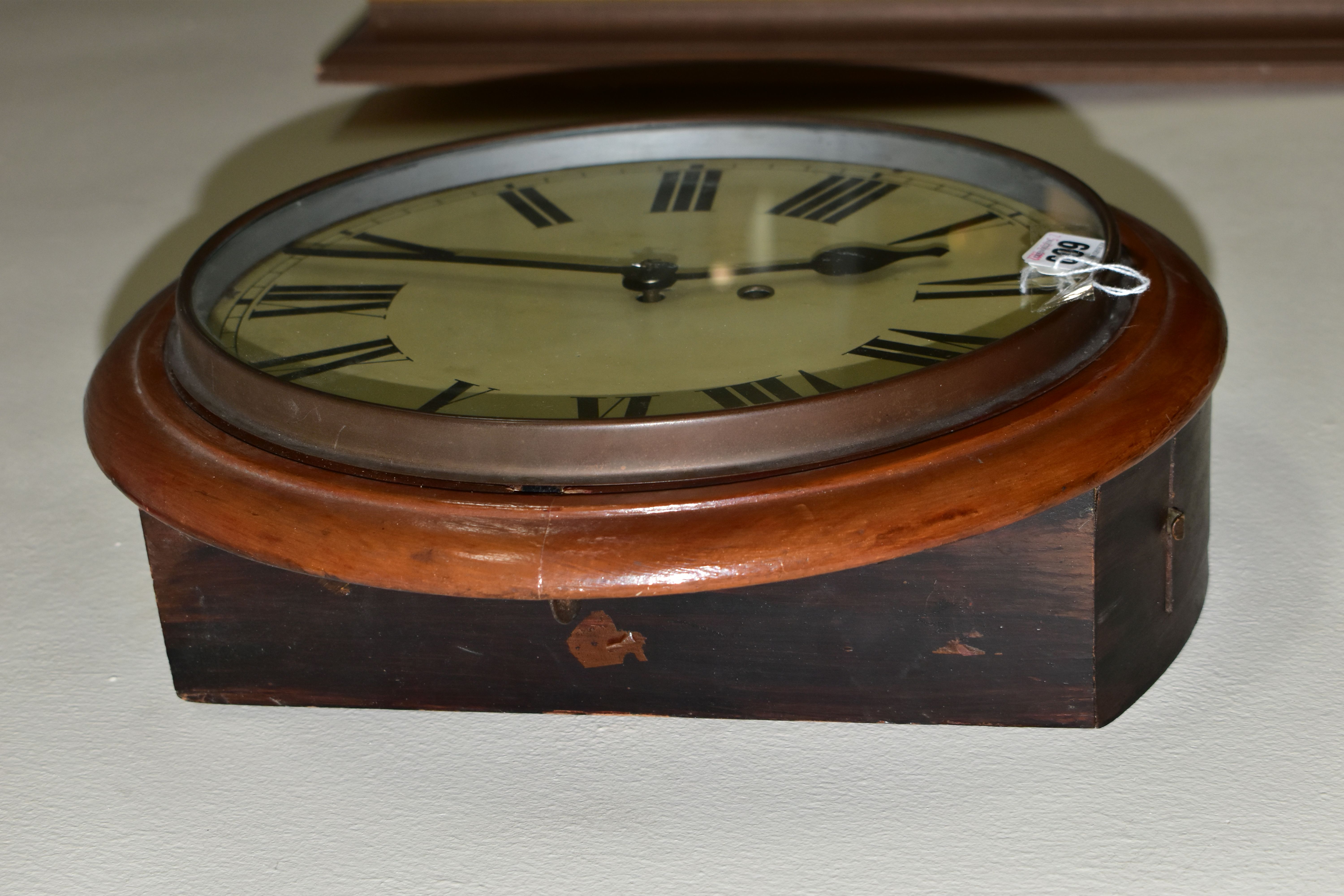 AN EARLY 20TH CENTURY CIRCULAR WALL CLOCK, 'train station style' with pendulum and key, Roman - Image 2 of 4