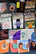 A CASE OF MIXED VINYL SINGLES, a hard case of approximately two hundred records, mixed genres