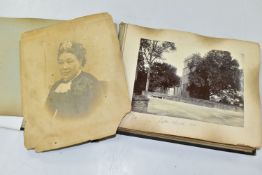 AN EARLY 20th CENTURY PHOTOGRAPH ALBUM, featuring approximately ninety-two images of people,