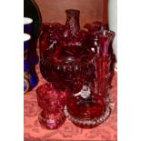 A GROUP OF CRANBERRY GLASS INCLUDING A PAIR OF MARY GREGORY STYLE VASES, with wavy rims, depicting a