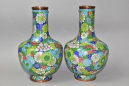A PAIR OF 20TH CENTURY CHINESE CLOISONNE BALUSTER VASES, profusely decorated with flowers on a green