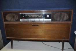 A GRUNDIG MANDELLO6/GB RADIOGRAM in good working order receiver and turntable working as should (PAT