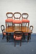 A VICTORIAN MAHOGANY WIND OUT DINING TABLE, with one additional leaf, on cylindrical fluted legs,