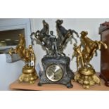 A FRENCH STYLE PEWTER CLOCK GARNITURE, the metal dial marked F.H.T with Arabic numerals, the case is