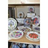 A GROUP OF COLLECTORS PLATES, thirty two plates, nine boxed, with themes to include dogs, flowers