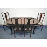 AN EARLY 20TH CENTURY MAHOGANY WIND OUT DINING TABLE, with rounded ends, one additional leaf, on