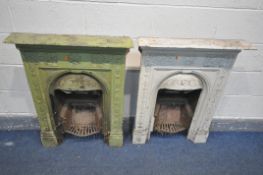 A PAIR OF CAST IRON FIRE PLACES, painted in green and cream, width 70cm x depth 29cm x height