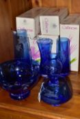 A GROUP OF BOXED BLUE CAITHNESS CRYSTAL VASES AND BOWLS, six pieces, five of which are boxed,