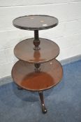 A REPRODUCTION MAHOGANY GRADUATED THREE TIER DUMB WAITER, on tripod legs, largest diameter 104cm x