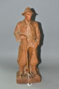 A HAND CARVED PINE WOOD FIGURE, of a mountain climber, 'Paul Émile Caron' style, height 42cm (1) (