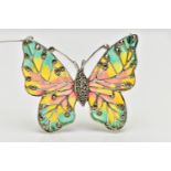 A PLIQUE A JOUR AND MARCASTITE BUTTERFLY BROOCH, the butterfly with marcasite set body and