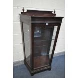 A MAHOGANY DISPLAY CABINET, with raised back, and canted corners, enclosing two glass shelves, width