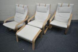 THREE IKEA POANG CANTILVER CHAIRS, with white cushions and headrests, along with one matching