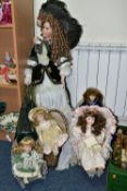 FIVE BISQUE HEAD COLLECTORS DOLLS, comprising a 100cm doll with supporting stand, an Alberon doll '