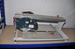 A PERFORMANCE POWER PPRTC600 TILE CUTTER with blade along with a B&Q bridge saw tile cutter with