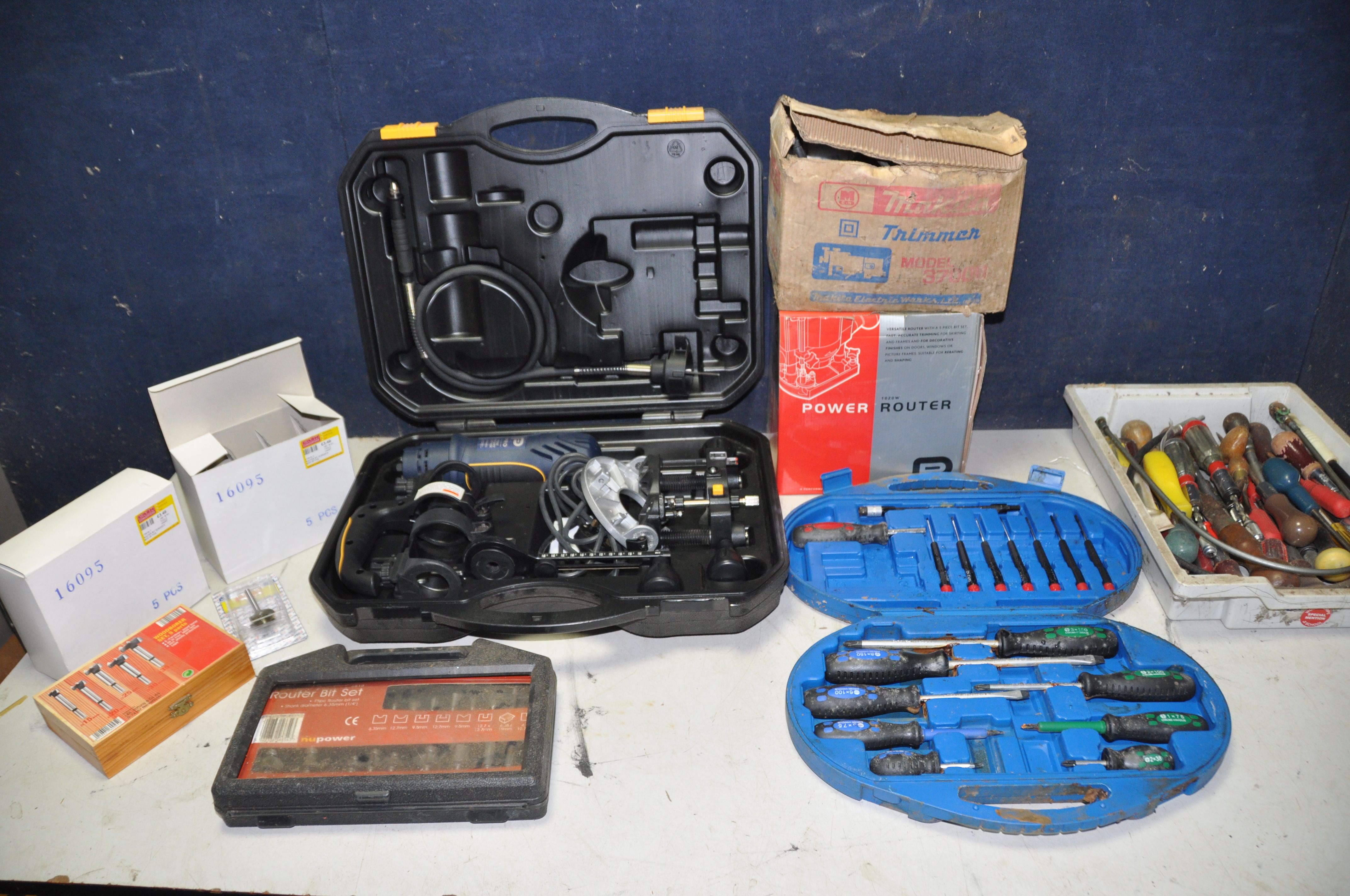 A PERFORMANCE POWER PRO CLM700RTC ROTARY CUTTER in original case with accessories along with a