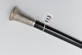 AN EARLY 20TH CENTURY SILVER MOUNTED WALKING STICK, a silver pommel intricately detailed with a