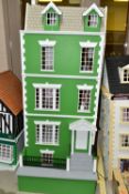 A LARGE MODERN WOODEN DOLLS HOUSE, modelled as a three storey Georgian villa with basement and attic