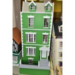 A LARGE MODERN WOODEN DOLLS HOUSE, modelled as a three storey Georgian villa with basement and attic