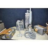 A KIRBY G7E ULTIMATE VACUUM CLEANER along with a large selection of accessories and attachments (PAT