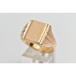 A GENTLEMANS YELLOW METAL SIGNET RING, designed as a rectangular shape plain polished panel, with