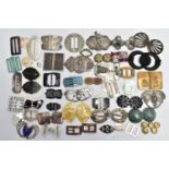 A SELECTION OF DECORATIVE BELT BUCKLES, to include an assortment of mother of pearl buckles, eastern