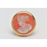 A YELLOW METAL CAMEO BROOCH, carved sardonyx of a circular form, depicting a lady in profile, within