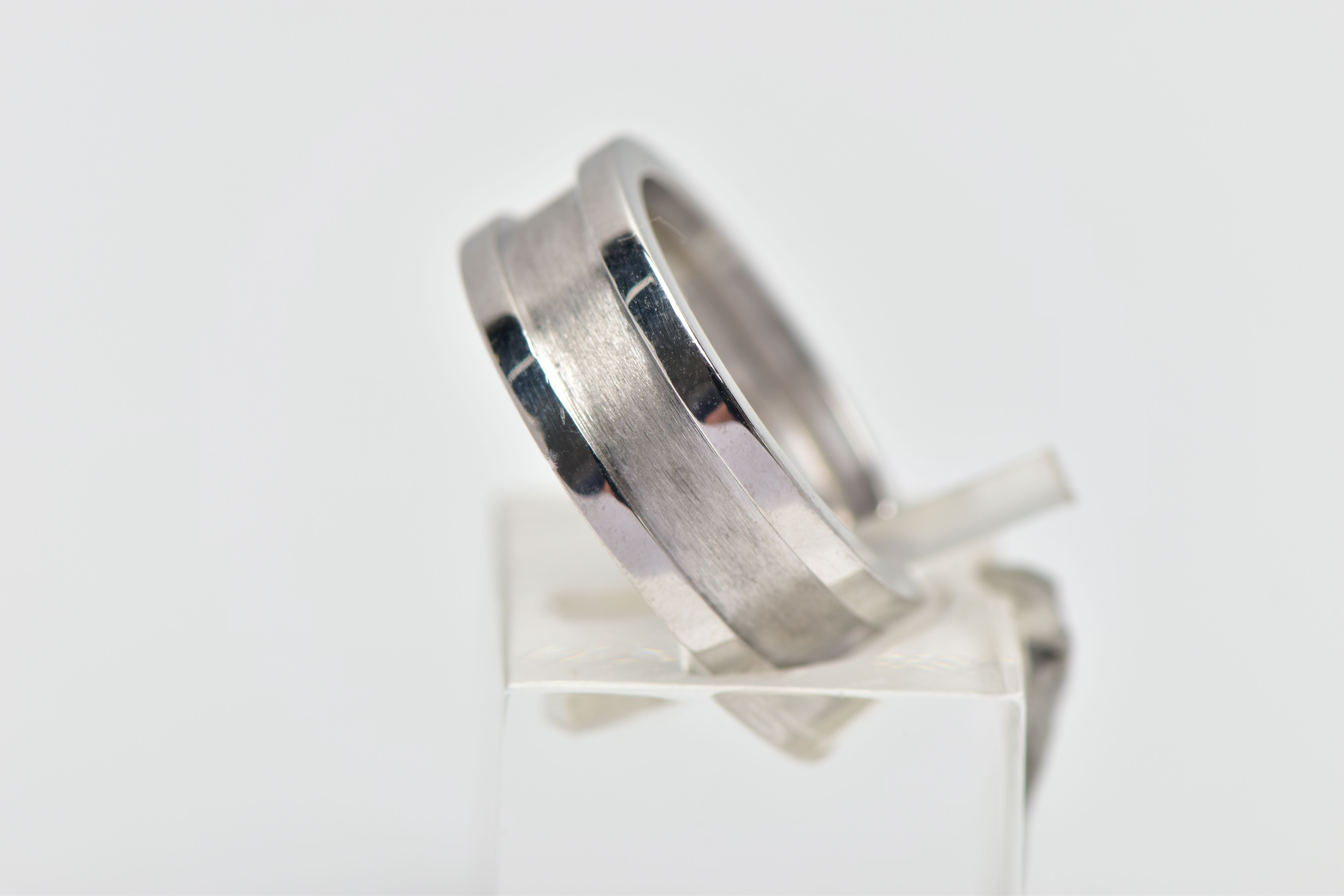 A 'C DE CARTIER' RING BY CARTIER, with polished and brushed detail, signed and numbered Cartier - Image 2 of 3