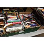 BOOKS, six boxes containing approximately 185 titles in hardback and paperback formats concerning