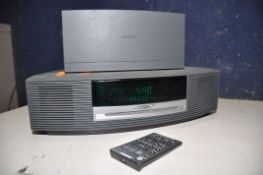 A BOSE AWRCC5 WAVE RADIO, along with Bose wave DAB module with remote (PAT pass and working) (2)