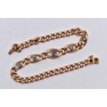 AN EARLY TO MID 20TH CENTURY GOLD SAPPHIRE CURB LINK BRACELET, designed as five graduated circular