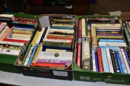 BOOKS, four boxes containing approximately 135 titles in hardback and paperback format, subject