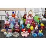 A QUANTITY OF COLOURED GLASSWARE, comprising a Murano clown, fish, parrot, fruit, three Brierly